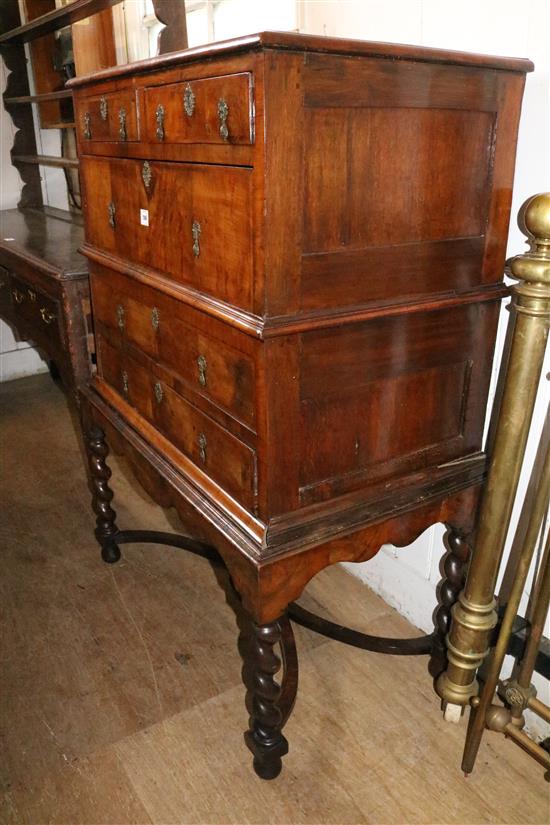 Walnut chest on stand(-)